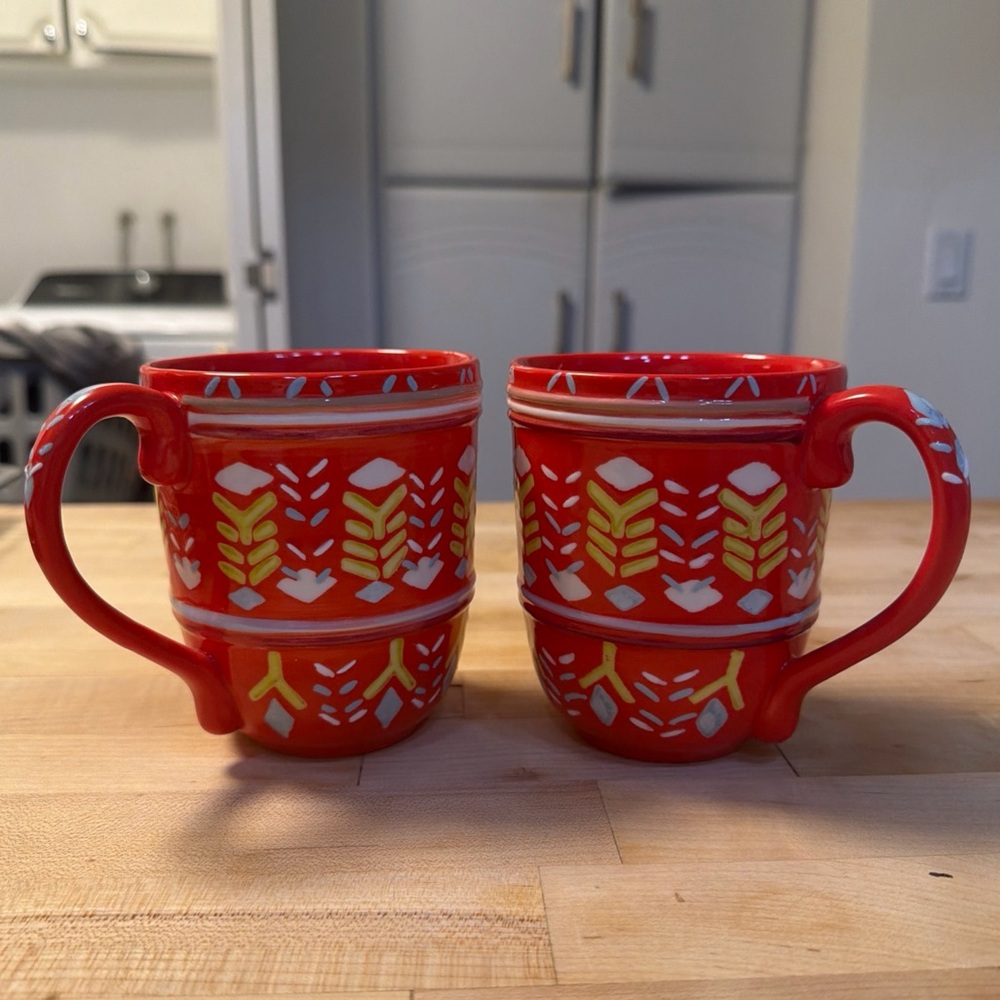 Anthropologie Orkney Orange Mugs Set of 2 with Yellow, Green & White Motif